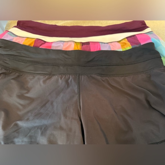 4 pairs used Lululemon running shorts with liner. All size 10. - Picture 2 of 3